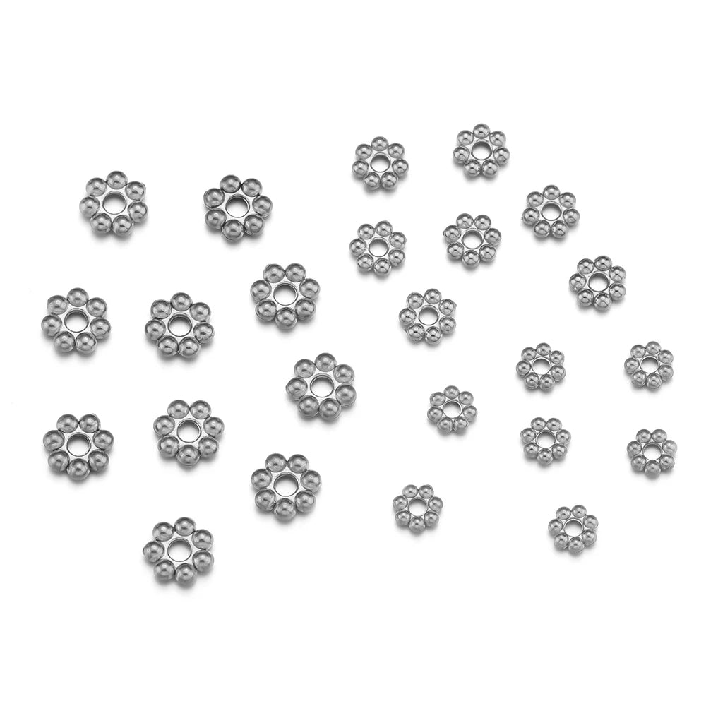 PERLINE DISTANZIATRICI A FORMA DI FIORE IN ACCIAIO