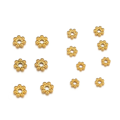 PERLINE DISTANZIATRICI A FORMA DI FIORE IN ACCIAIO