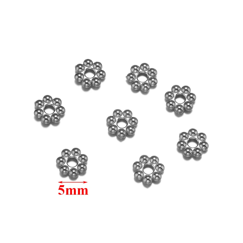 PERLINE DISTANZIATRICI A FORMA DI FIORE IN ACCIAIO