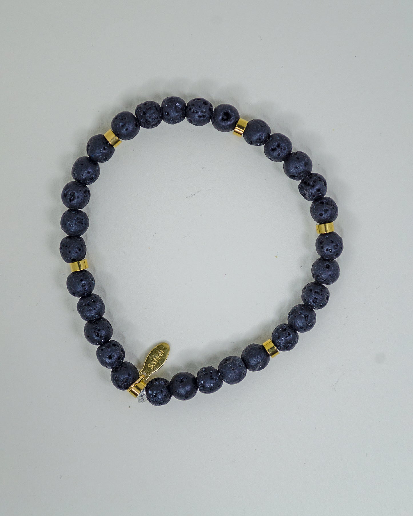 BRACCIALE PIETRA LAVICA E DISTANZIATORI IN ACCIAIO