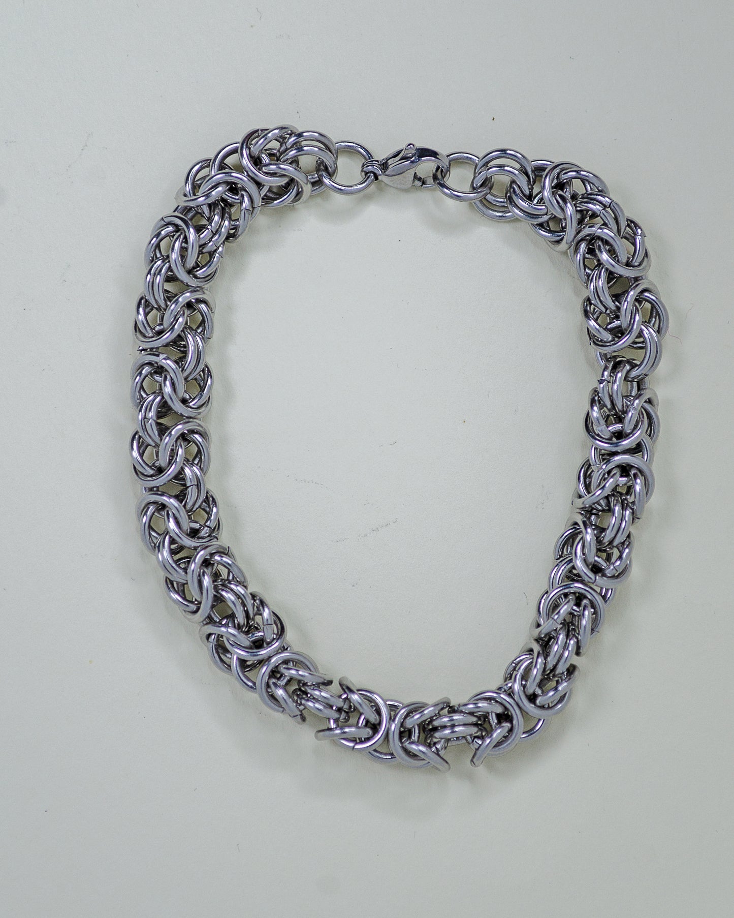 BRACCIALE PAZIENZA INTRECCIATA